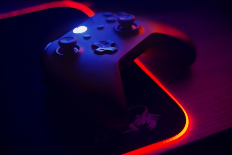 Gaming setup with controller; illustrative photo, not the battery kit